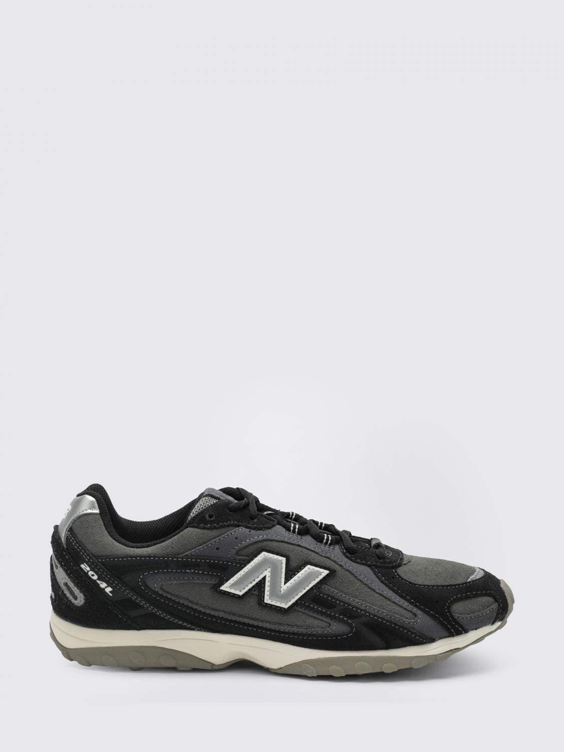 NEW BALANCE Sneakers Men color Black