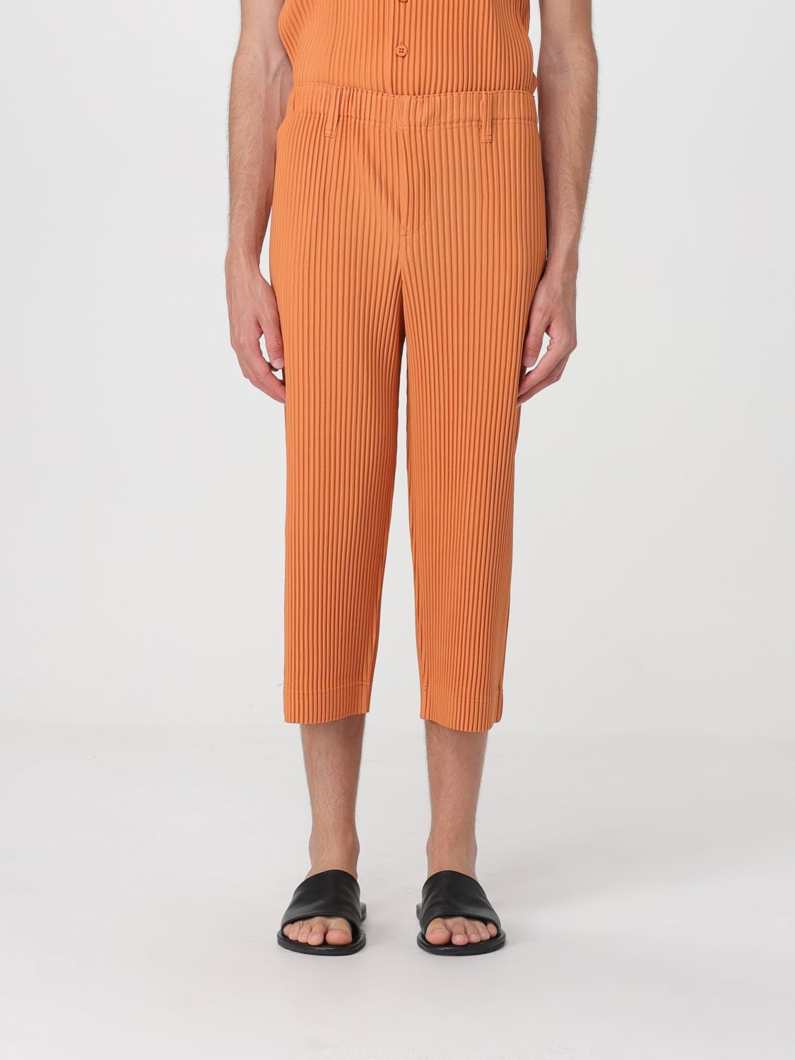 HOMME PLISSE' ISSEY MIYAKE Pantaloni cropped plissettati Homme Plissé Issey Miyake in crêpe tecnico