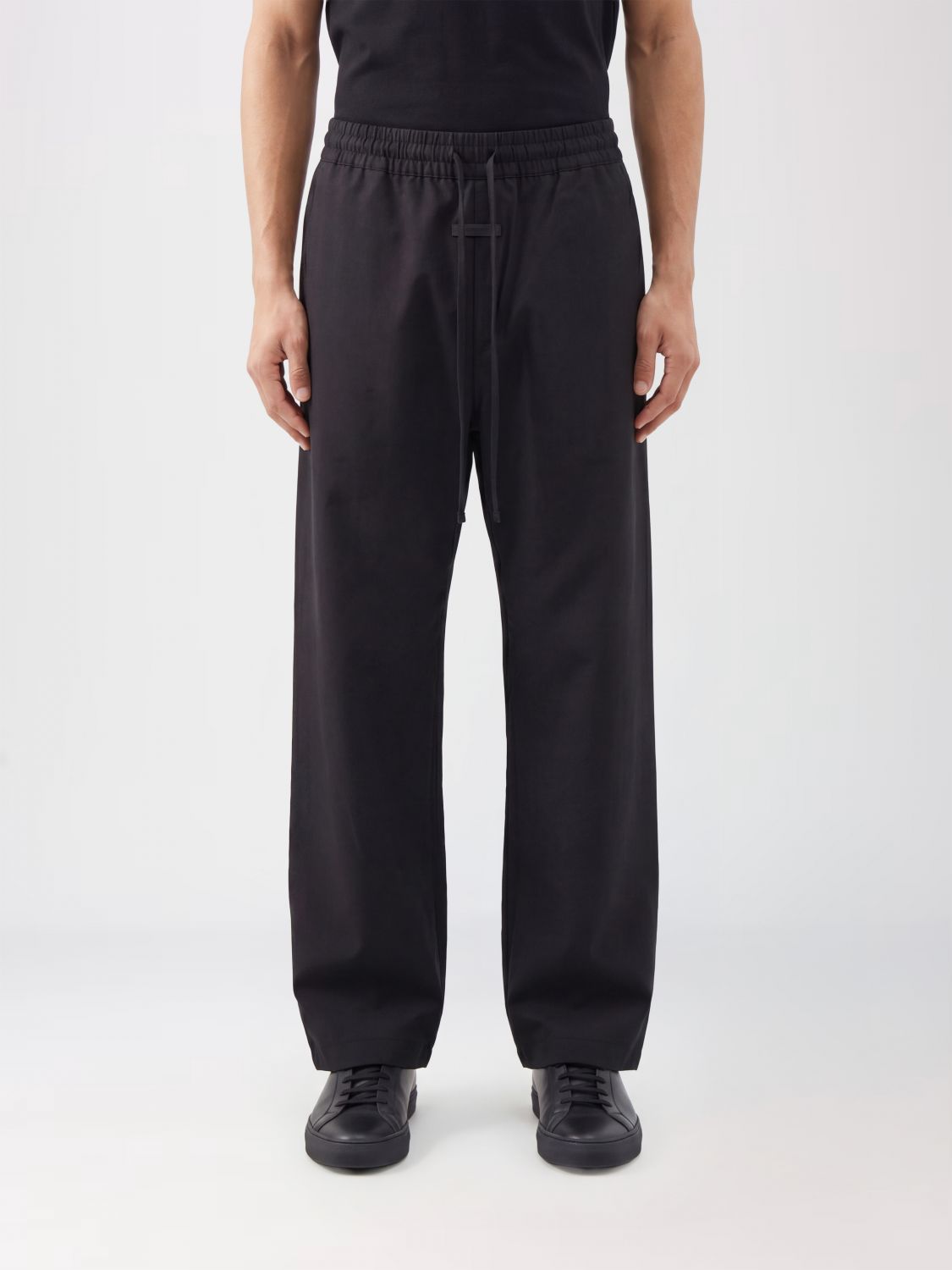 FEAR OF GOD Pants Men color Black