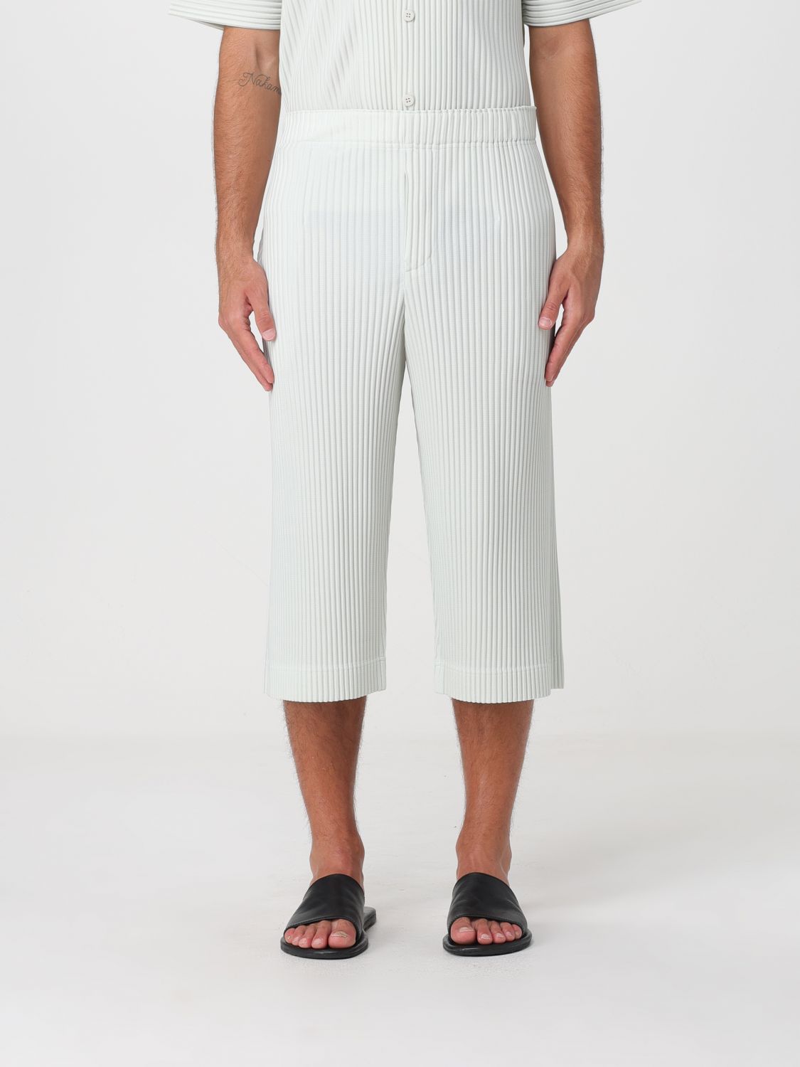 HOMME PLISSE' ISSEY MIYAKE Pantaloni cropped slim Homme Plissé Issey Miyake in tessuto tecnico plissettato