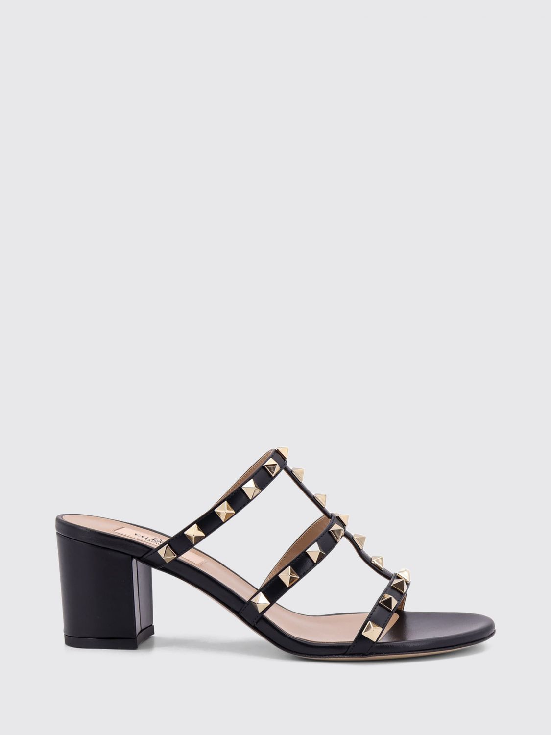 VALENTINO GARAVANI Sandali mules Rockstud in pelle con borchie e tacco medio