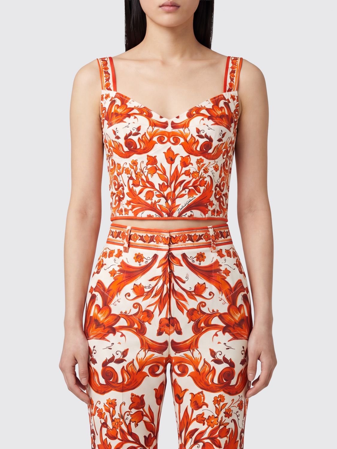 DOLCE & GABBANA Top cropped a corsetto in seta con stampa Maioliche