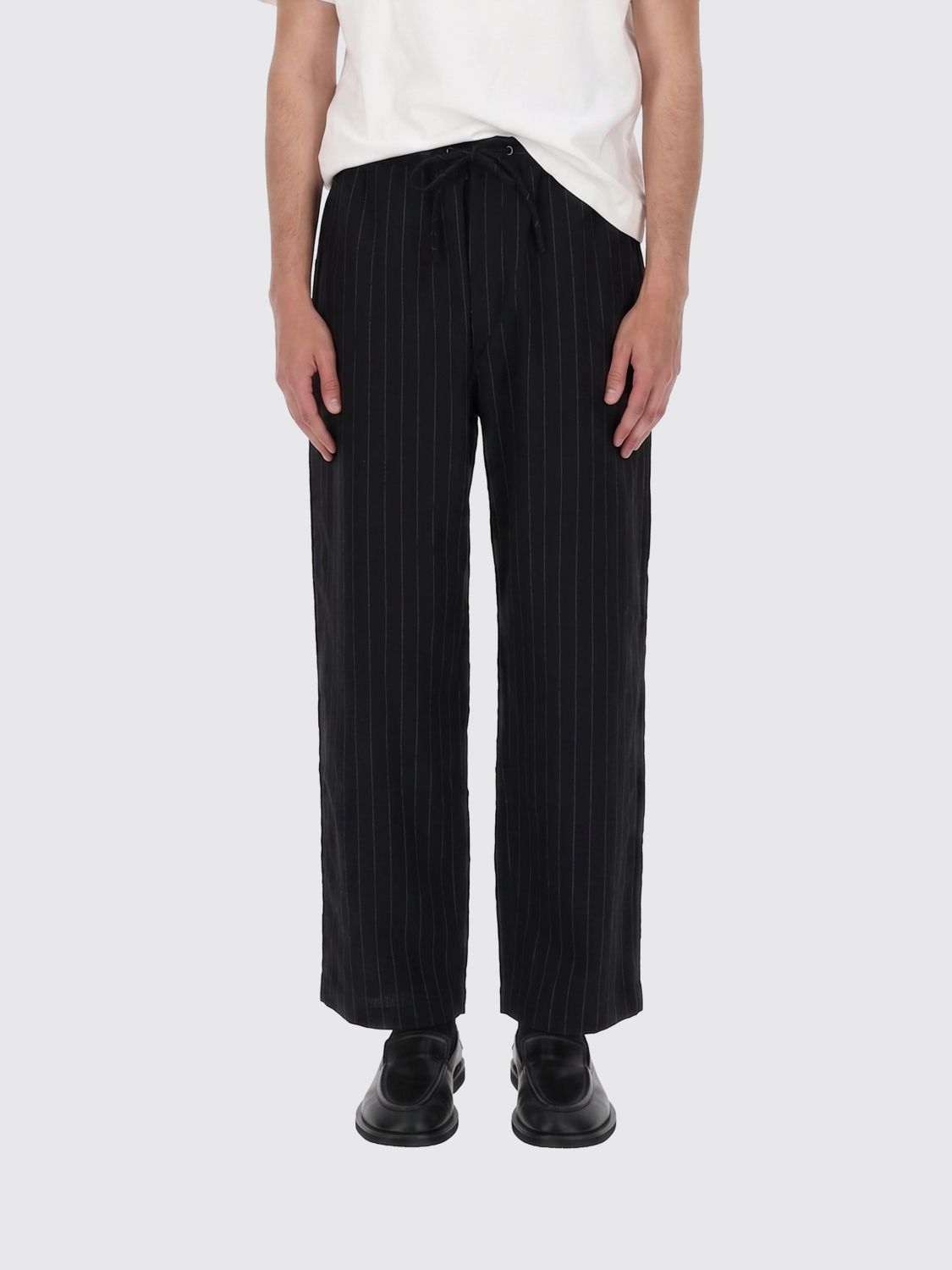 STUDIO NICHOLSON Pants Men color Black