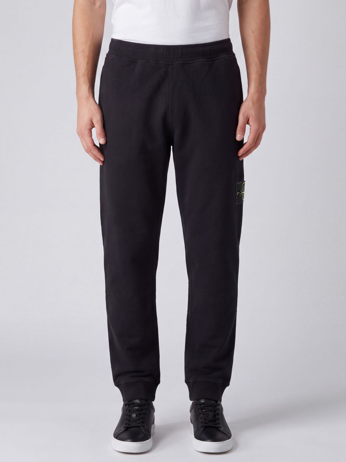 STONE ISLAND Pantaloni jogging in poliestere riciclato con logo Compass