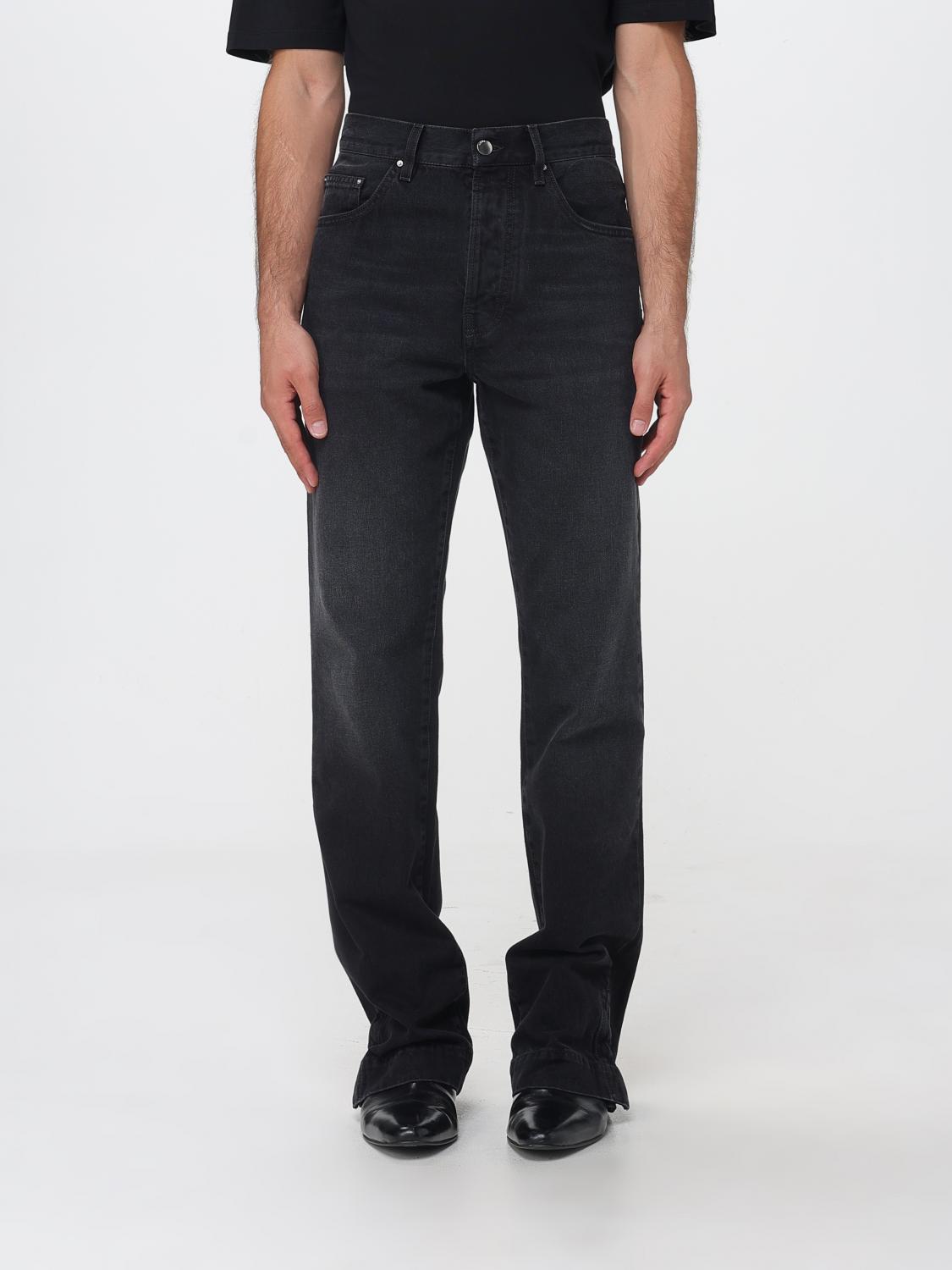 AMIRI Straight-Leg-Jeans aus Baumwolldenim von mit metallischem Logo hinten