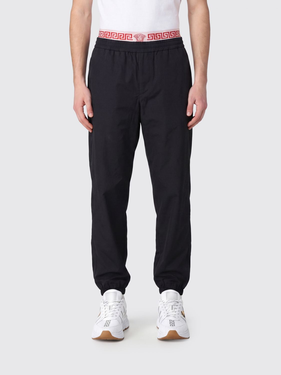 VERSACE Pants Men color Black