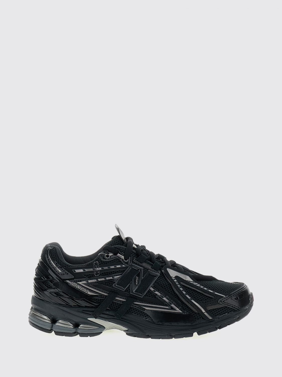 NEW BALANCE Sneakers Men color Black