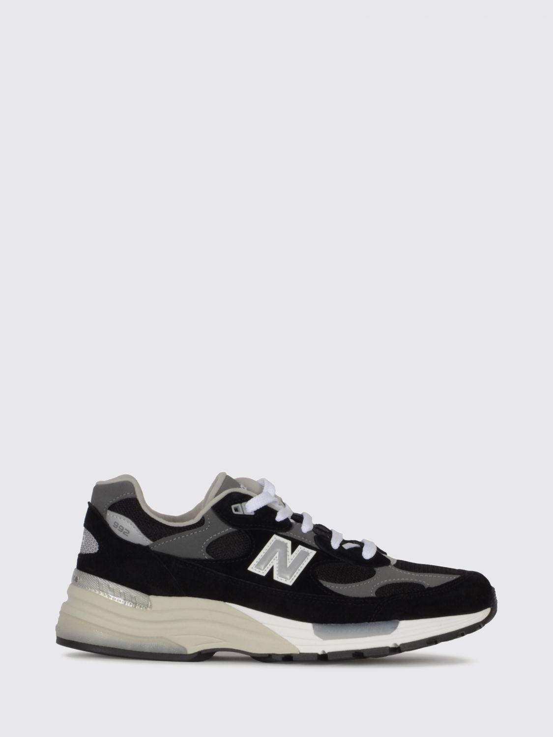NEW BALANCE Sneakers Men color Black