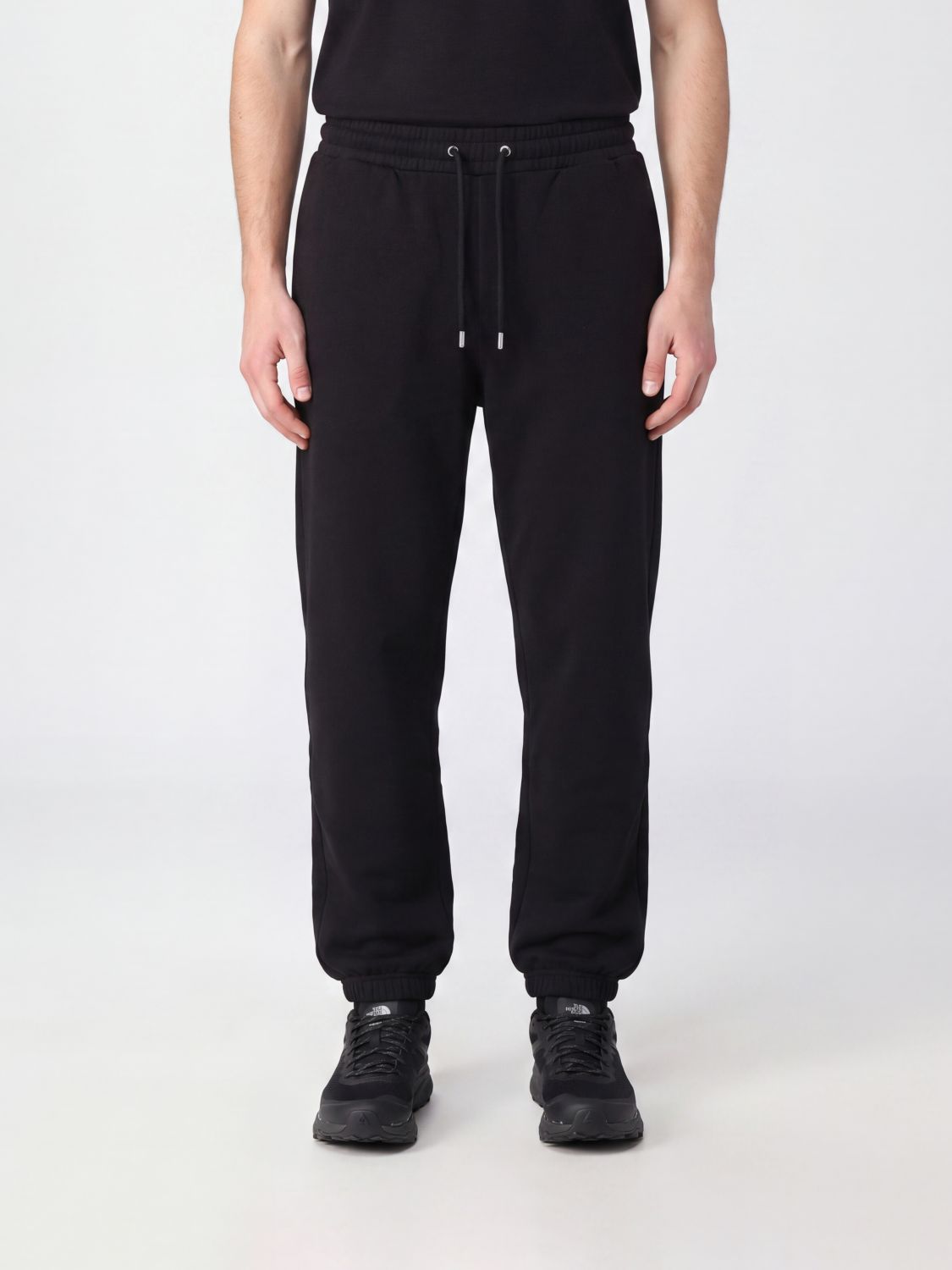 THE NORTH FACE Pants Men color Black