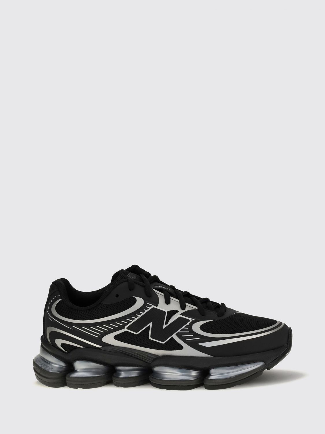 NEW BALANCE Sneakers Men color Black