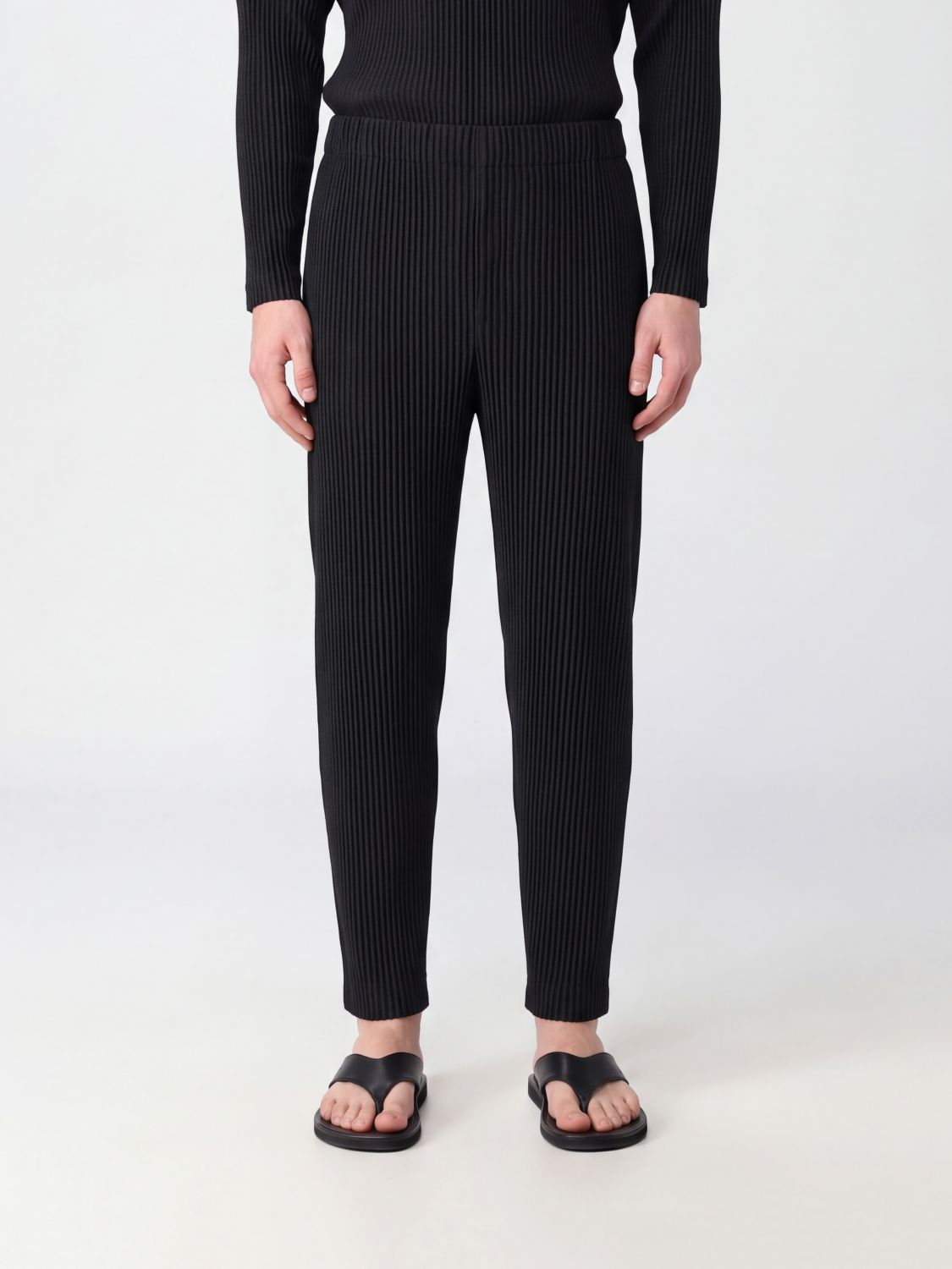 HOMME PLISSE’ ISSEY MIYAKE Pants Men color Black