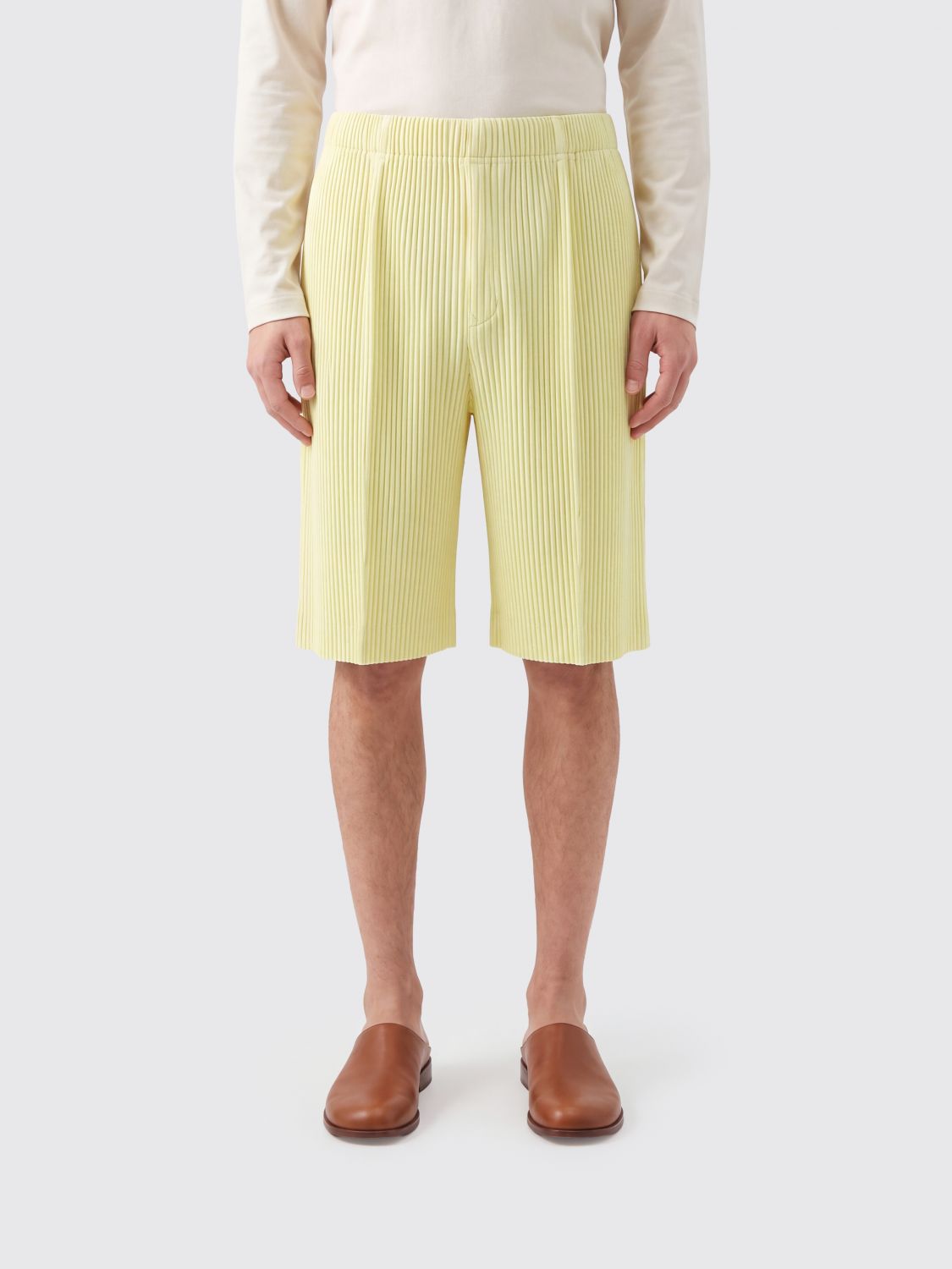 HOMME PLISSE' ISSEY MIYAKE Pants Men color Yellow