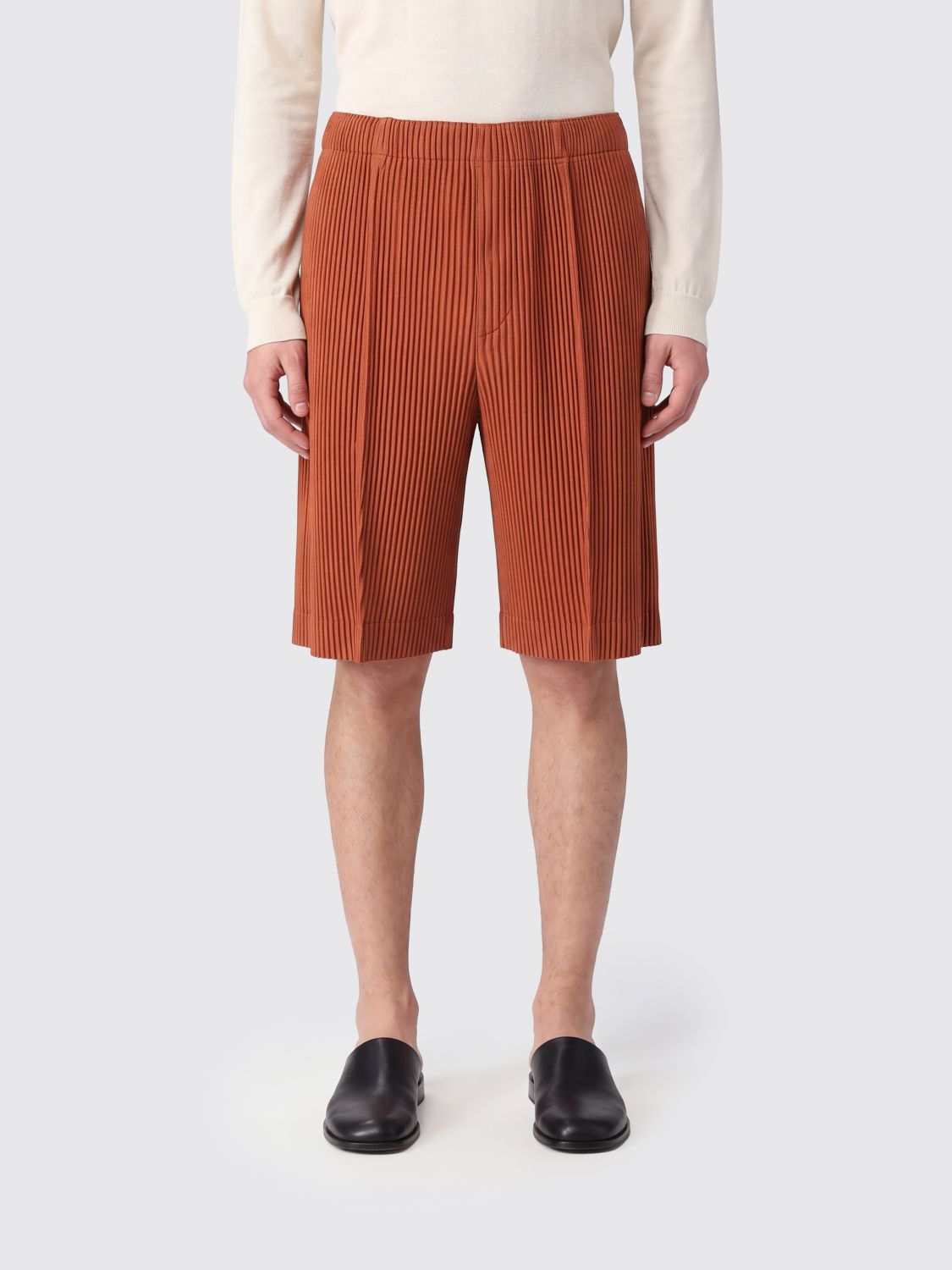 HOMME PLISSE' ISSEY MIYAKE Pants Men color Orange