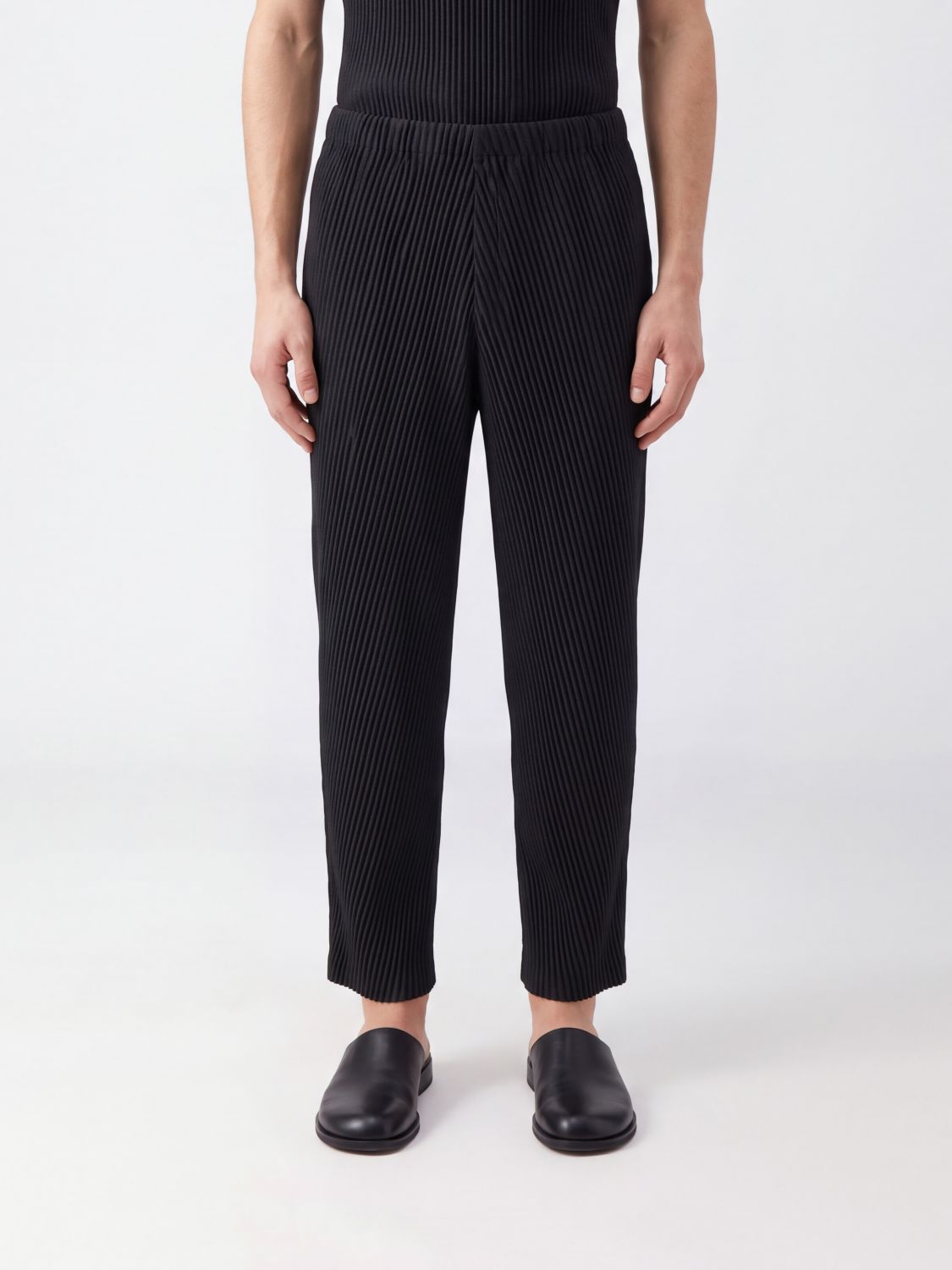 HOMME PLISSE' ISSEY MIYAKE Pants Men color Black